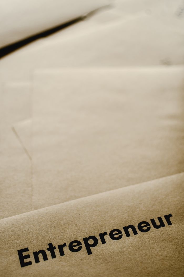 A close-up of brown paper with the word 'entrepreneur,' inspiring business and creativity.
